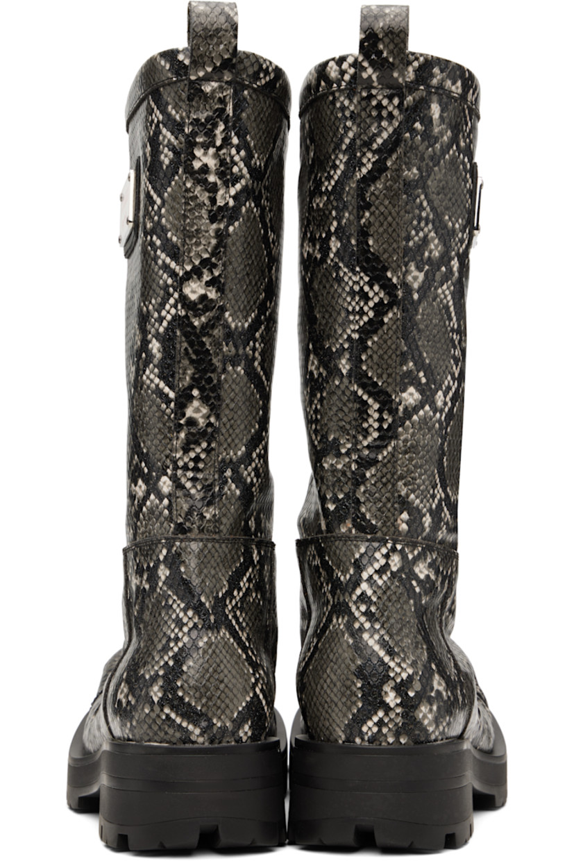 Mid-calf snake-embossed faux-leather boots in gray. 

· Modified square toe
· Logo plaque at outer side
· Pull-loop at heel collar
· Buffed leather lining
· Stacked rubber heel
· Treaded rubber sole
· Heel: H1.75"

Supplier color: Grey snake
