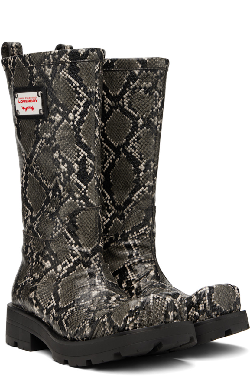 Mid-calf snake-embossed faux-leather boots in gray. 

· Modified square toe
· Logo plaque at outer side
· Pull-loop at heel collar
· Buffed leather lining
· Stacked rubber heel
· Treaded rubber sole
· Heel: H1.75"

Supplier color: Grey snake