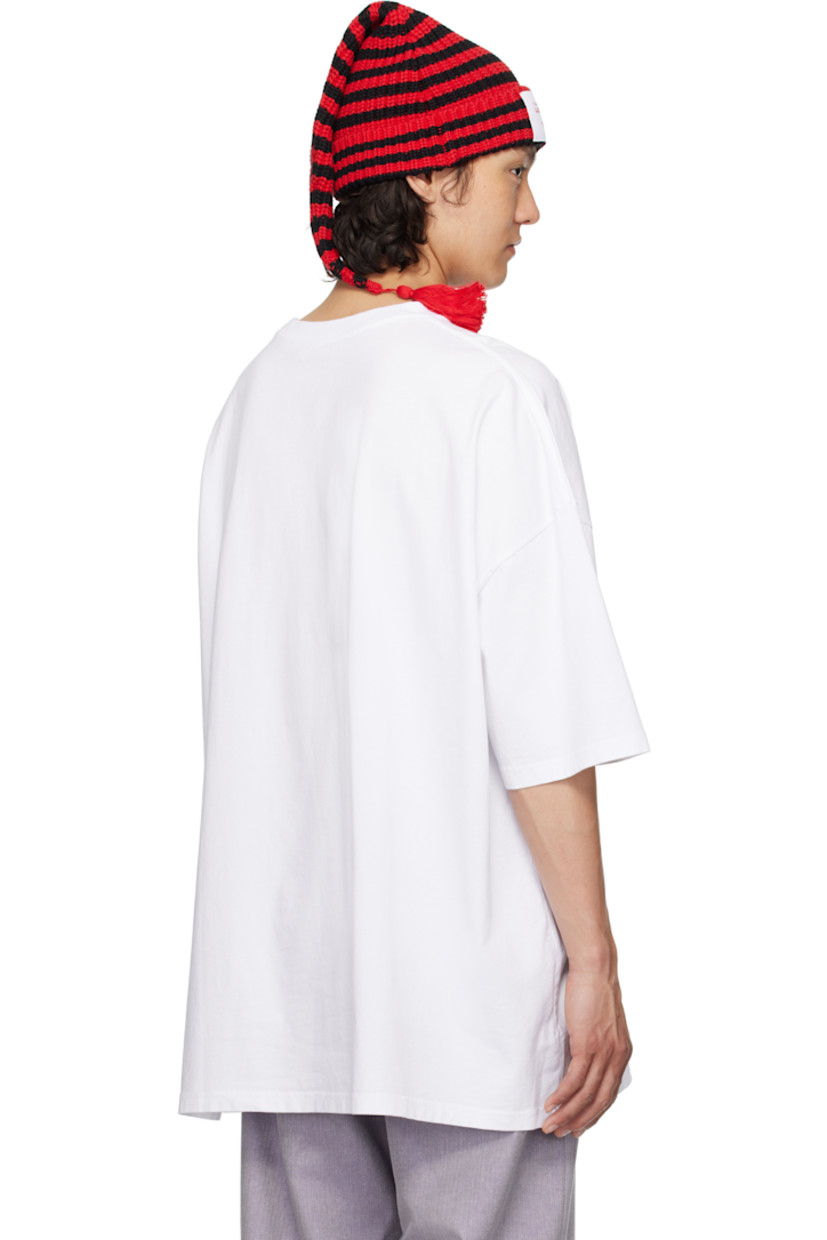Organic cotton jersey T-shirt.

· Rib-knit crewneck
· Graphics and logo printed at front
· Logo patch at front hem
· Dropped shoulders

Supplier color: Knitted blue perfume graphic
