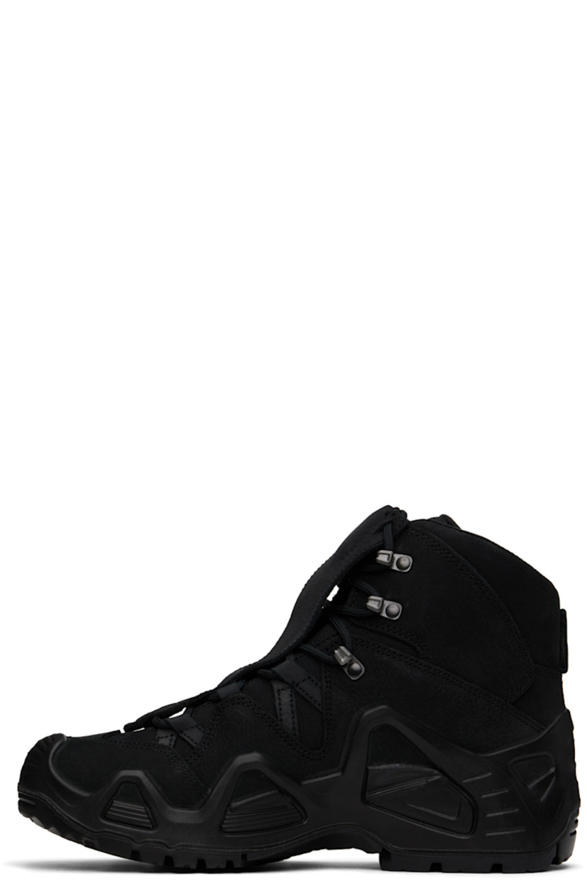 Mid-top GORE-TEX® nubuck and grained leather sneakers in black.

· Lightweight, waterproof, and tear-resistant
· Logo printed at vamp and outer side
· Concealed lace-up closure
· Padded tongue and collar
· Pull-loop at heel tab
· Mesh lining
· MONOWRAP stability frame at midsole
· Treaded X-TRAC® rubber sole

Part of the AFFXWRKS x LOWA collaboration.

Supplier color: Black/Black