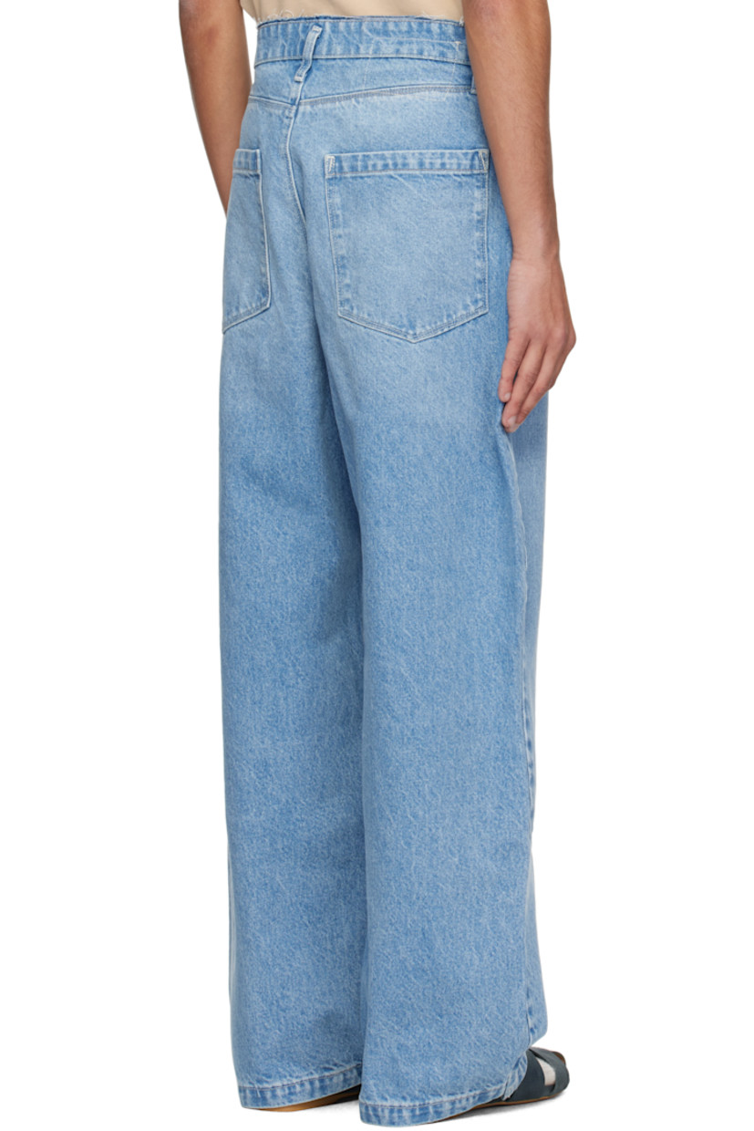 Loose-fit and wide-leg non-stretch denim jeans. Fading and whiskering throughout.

· Raw edge at waistband
· Belt loops
· Five-pocket styling
· Zip fly
· Partially exposed pocket lining
· Dropped inseam
· Horn and logo-engraved silver-tone hardware

Supplier color: Light blue