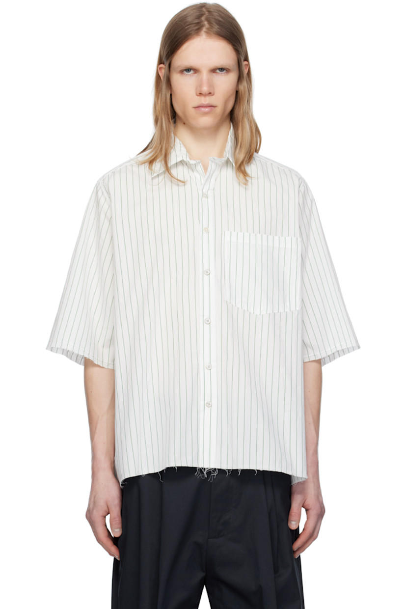 Cotton poplin shirt. Stripes throughout. 

· Spread collar 
· Button closure 
· Patch pocket at chest 
· Raw edge at hem and cuffs 
· Twin pleats at back yoke 
· Mother-of-pearl hardware

Supplier color: Green/White stripe