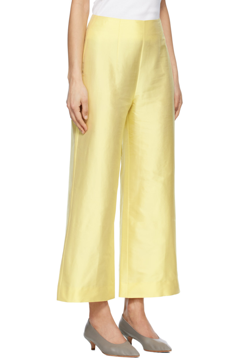 Slub silk satin trousers. Zip closure at outseam.

Supplier color: Yellow