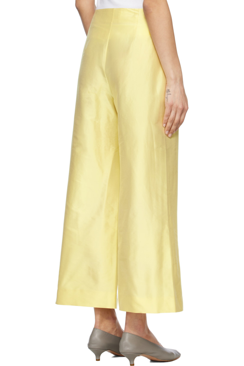 Slub silk satin trousers. Zip closure at outseam.

Supplier color: Yellow