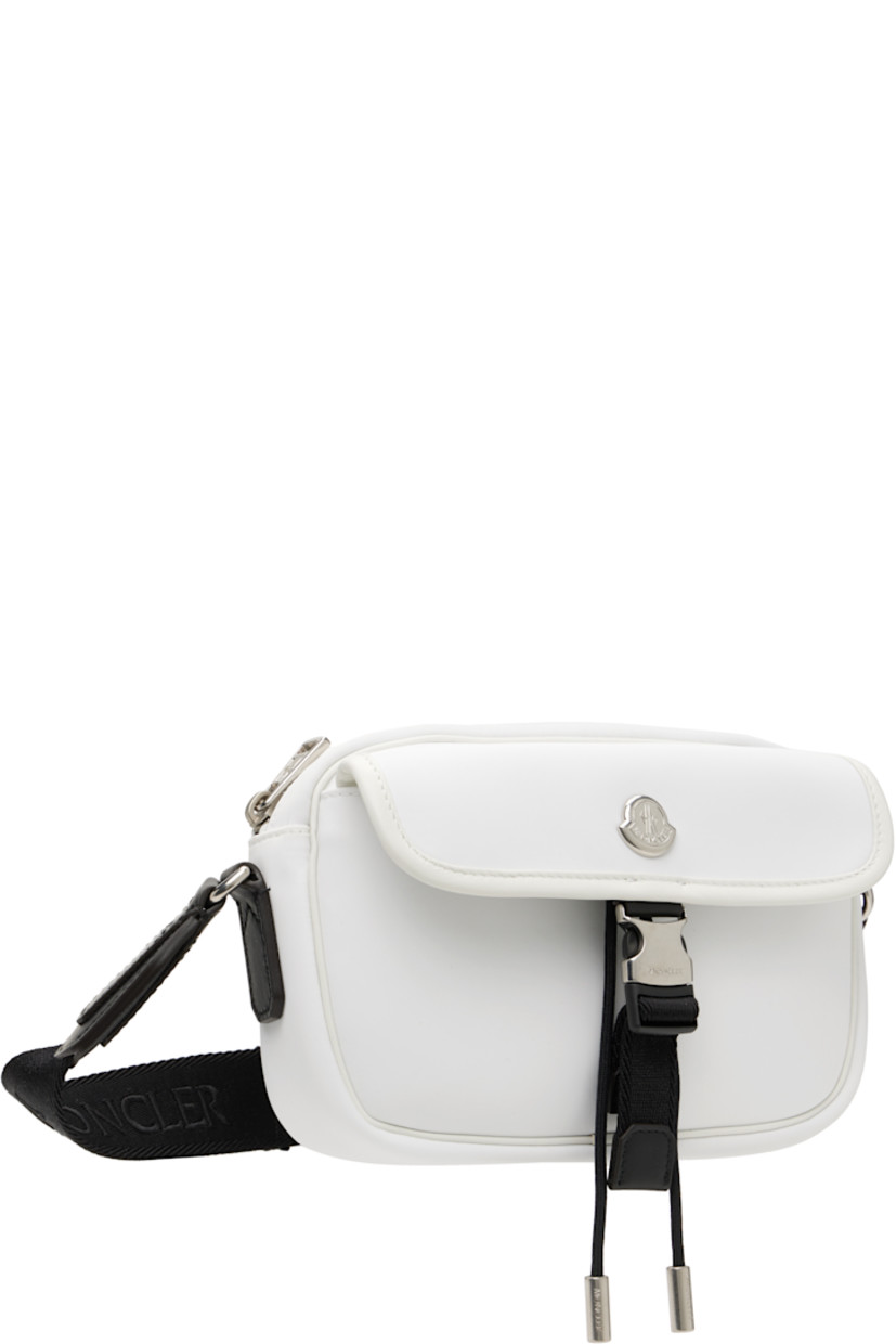 Taffeta pouch in white.

· Adjustable crossbody strap
· Logo hardware and flap pocket at face
· Zip closure
· Zip pocket at interior
· Twill lining
· H5.5" x W8" x D2.25"

Supplier color: Silk white