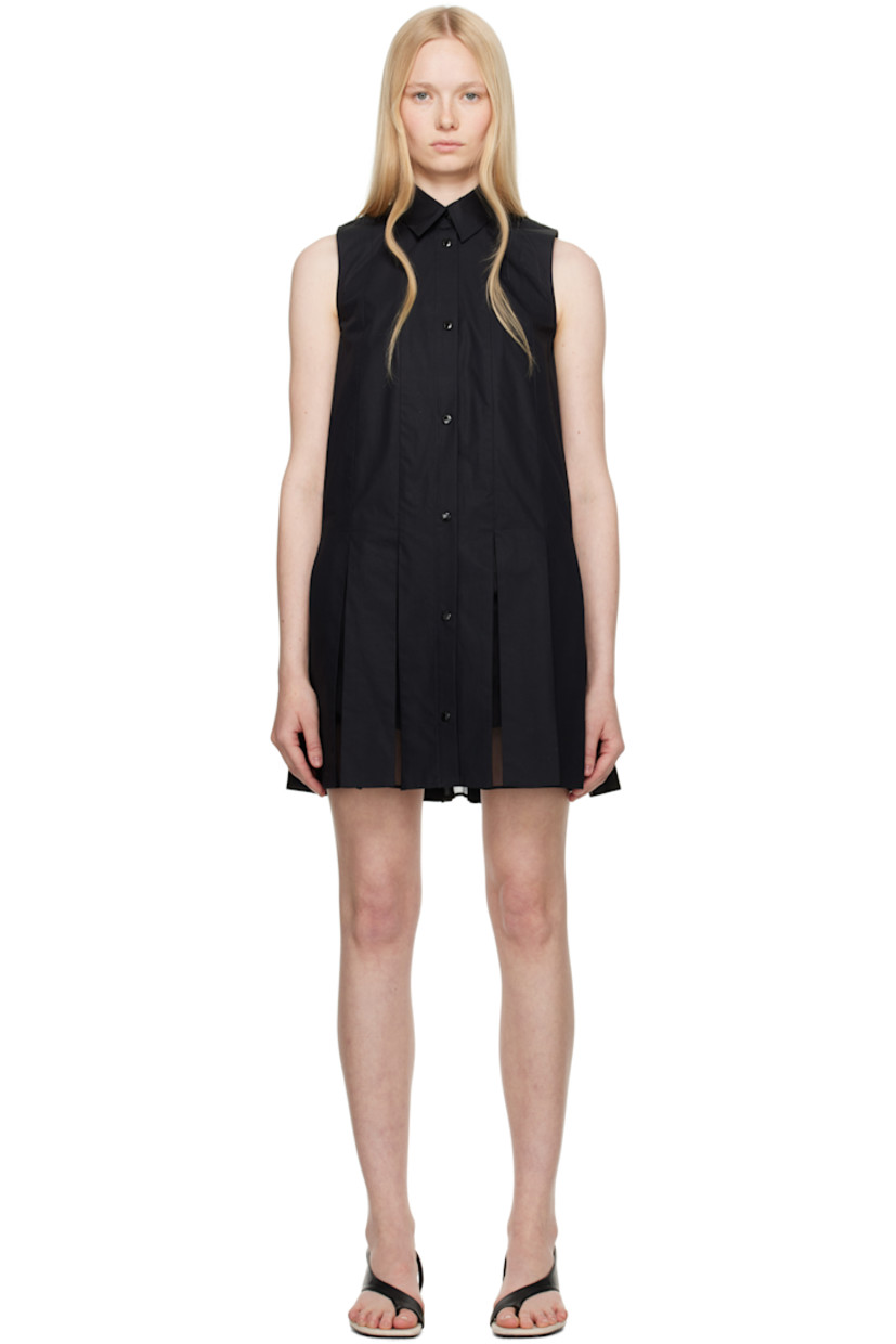 Cotton poplin minidress.

· Spread collar
· Press-stud closure
· Silk organza panels and pleats at hem
· Embroidered logo patch at back collar
· Cotton poplin shorts-style underlay

Supplier color: Black