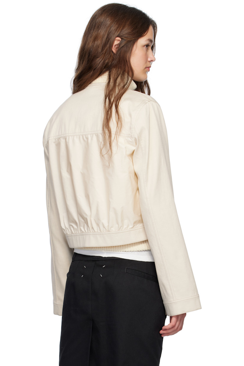 Non-stretch cotton- and flax-blend denim jacket. 

· Paneled construction 
· Round neck
· Button closure
· Flap pockets
· Welt pockets
· Logo patch at sleeve
· Buttoned barrel cuffs
· Nylon satin panel and gathering at back  
· Partial satin lining
· Logo-engraved silver-tone hardware

Supplier color: White