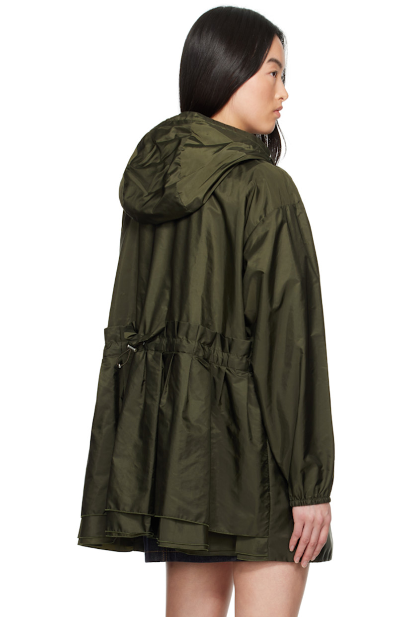 Water-repellent recycled nylon taffeta jacket.

· Bungee-style drawstring at hood and pleated back
· Stand collar
· Two-way zip closure
· Zip pockets
· Embroidered logo patch at sleeve
· Elasticized cuffs
· Partially lined
· Logo-engraved silver-tone hardware

Supplier color: Green