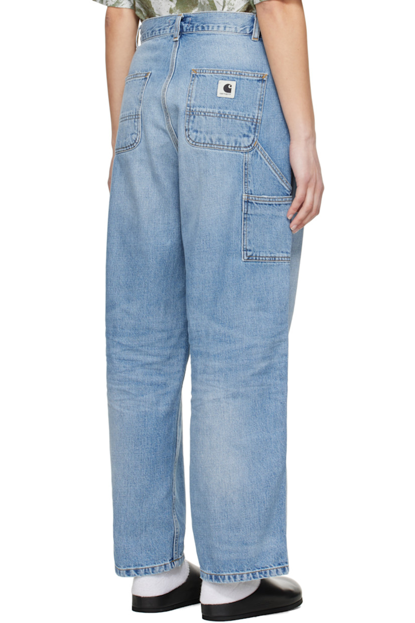 Loose-fit 12 oz non-stretch denim jeans. Fading, whiskering, and subtle distressing throughout. 

· Belt loops
· Mid-rise
· Five-pocket styling
· Zip fly
· Patch pockets at outseam
· Hammer loop and patch pocket at outseam
· Logo patch at back pocket
· Logo-engraved gunmetal-tone hardware
· Contrast stitching in tan

Supplier color: Blue (burst washed)