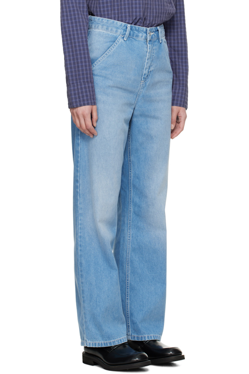 Loose-fit 11.25 oz non-stretch denim jeans. Fading and whiskering throughout.

· Mid-rise
· Belt loops
· Four-pocket styling
· Zip fly
· Logo patch at back pocket
· Logo-engraved silver-tone hardware
· Contrast stitching in white

Supplier color: Blue (light true washed)