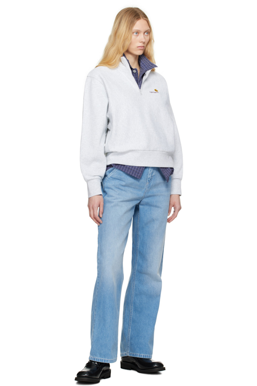 Loose-fit 11.25 oz non-stretch denim jeans. Fading and whiskering throughout.

· Mid-rise
· Belt loops
· Four-pocket styling
· Zip fly
· Logo patch at back pocket
· Logo-engraved silver-tone hardware
· Contrast stitching in white

Supplier color: Blue (light true washed)