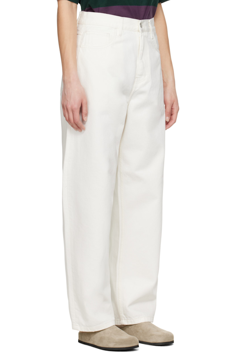Loose-fit 12 oz non-stretch denim jeans. 

· Mid-rise
· Belt loops
· Four-pocket styling
· Zip fly
· Logo patch at back pocket
· Logo-engraved silver-tone hardware

Supplier color: White (rinsed)
