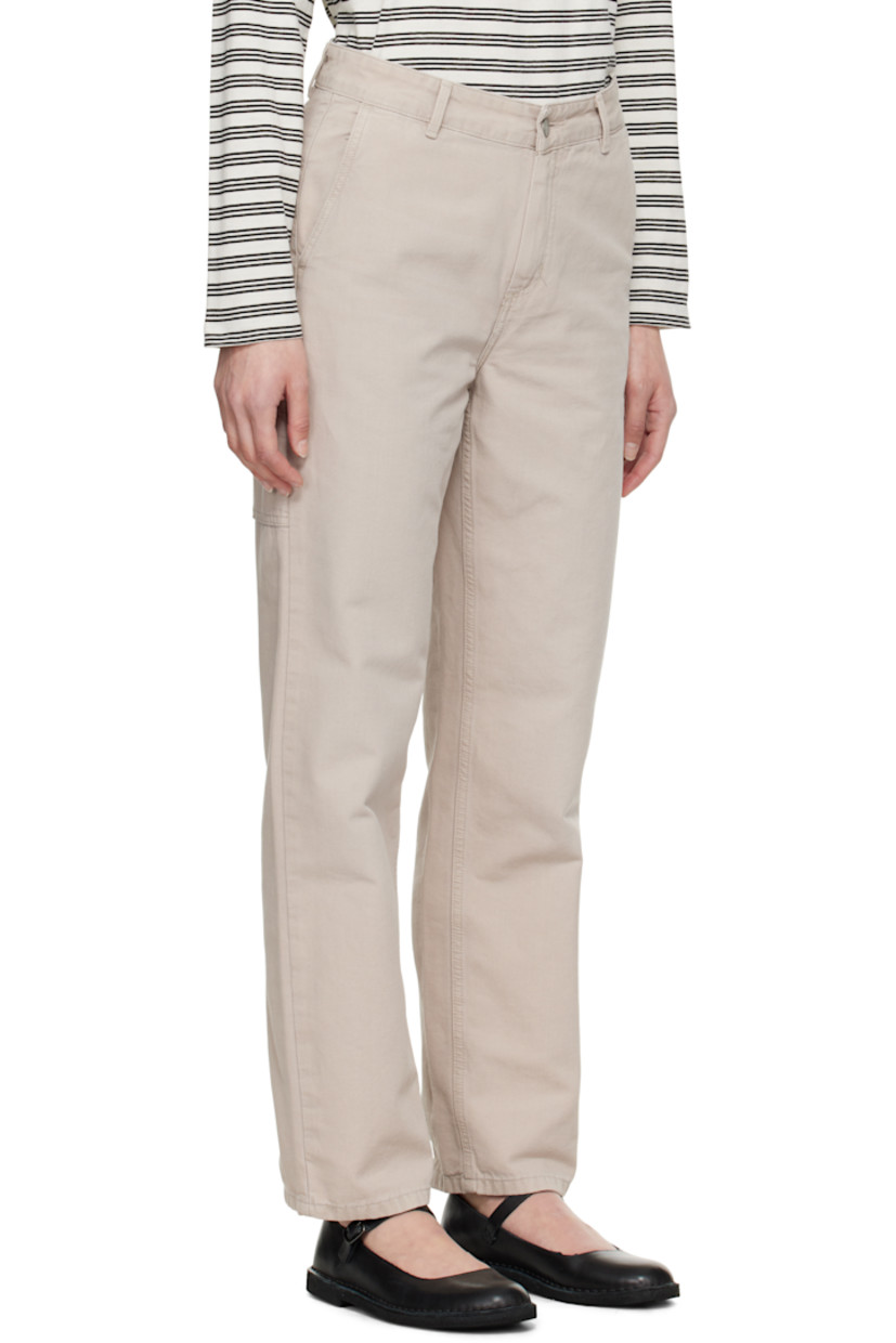 Stone-dyed 9 oz cotton canvas trousers. 

· Loose-fit and straight-leg
· Mid-rise
· Four-pocket styling
· Zip fly
· Patch pockets at outseam
· Hammer loop and patch pocket at outseam
· Logo patch at back pocket
· Logo-engraved silver-tone hardware

Supplier color: Dusty beige (stone canvas)