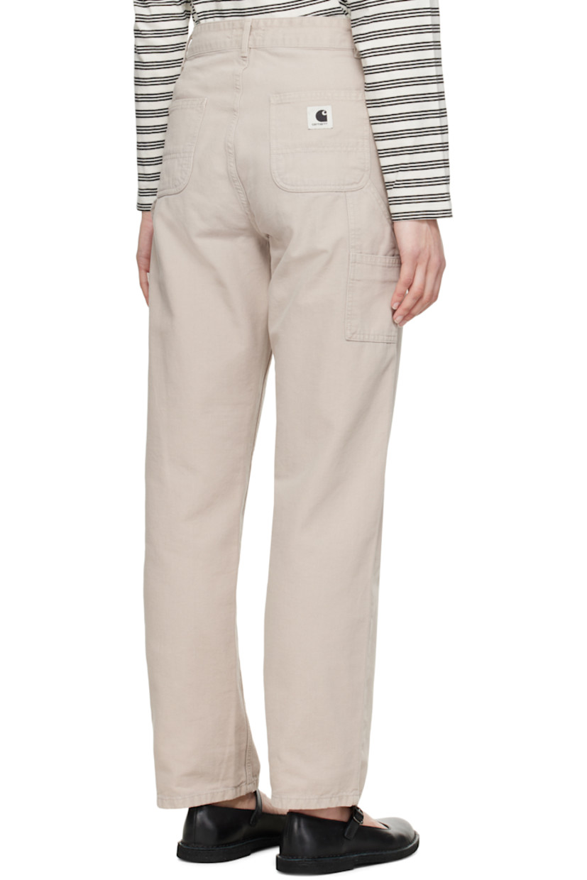 Stone-dyed 9 oz cotton canvas trousers. 

· Loose-fit and straight-leg
· Mid-rise
· Four-pocket styling
· Zip fly
· Patch pockets at outseam
· Hammer loop and patch pocket at outseam
· Logo patch at back pocket
· Logo-engraved silver-tone hardware

Supplier color: Dusty beige (stone canvas)
