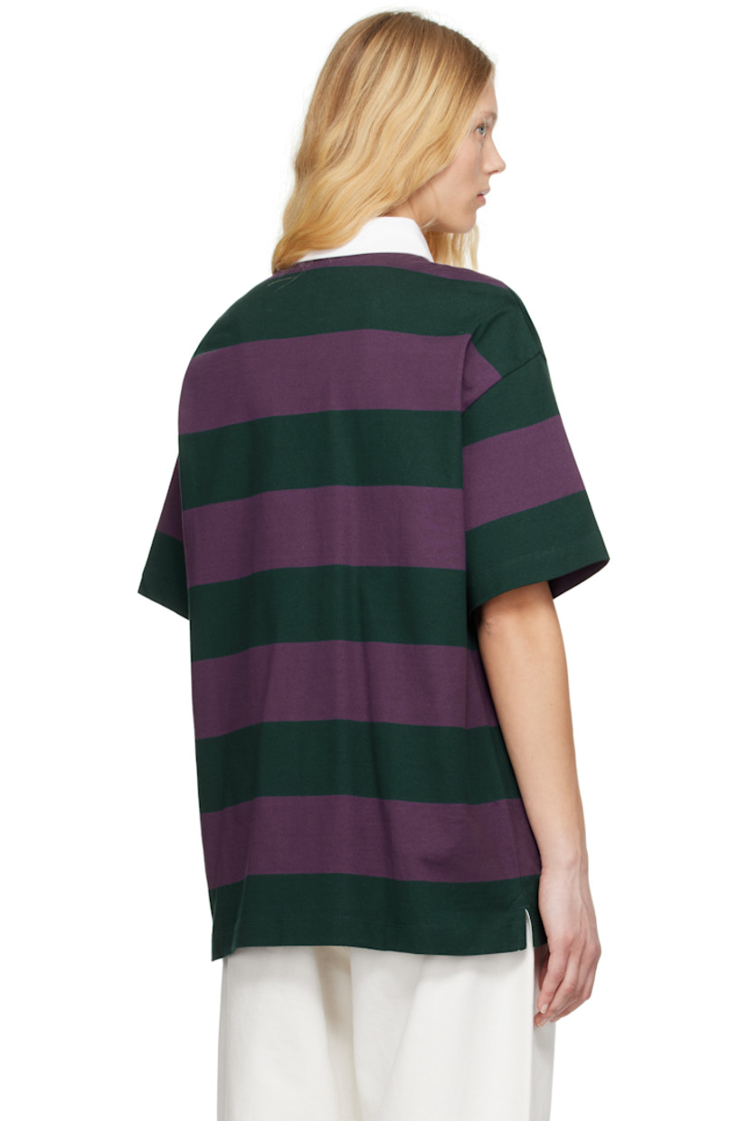 Yarn-dyed 260 gsm cotton jersey polo. Intarsia stripes throughout.

· Loose-fit
· Cotton twill spread collar
· Concealed three-button placket
· Logo embroidered at chest
· Tennis-tail hem
· Dropped shoulders

Supplier color: Seffner stripe/Conifer