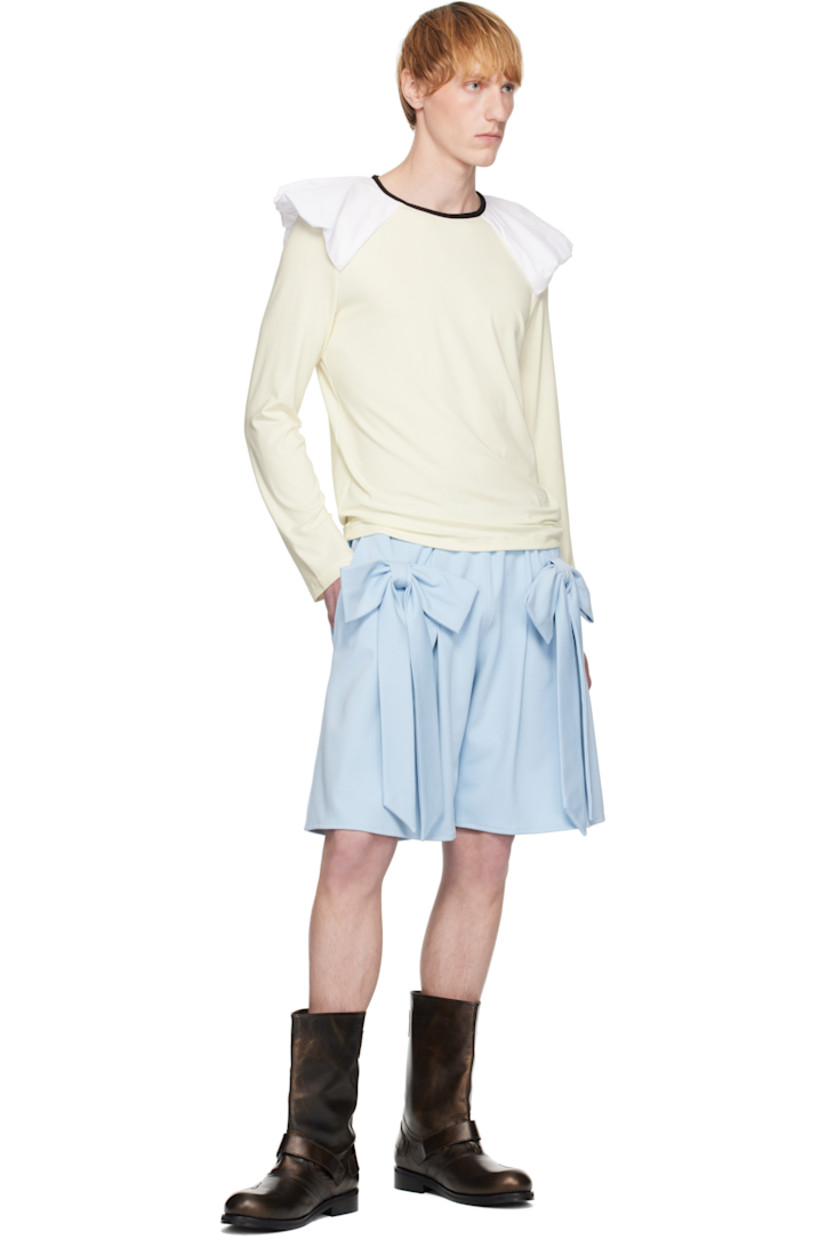 Stretch viscose jersey top.

· Crewneck
· Structured cotton poplin panel at shoulders 
· Raglan sleeves

Supplier color: Ecru