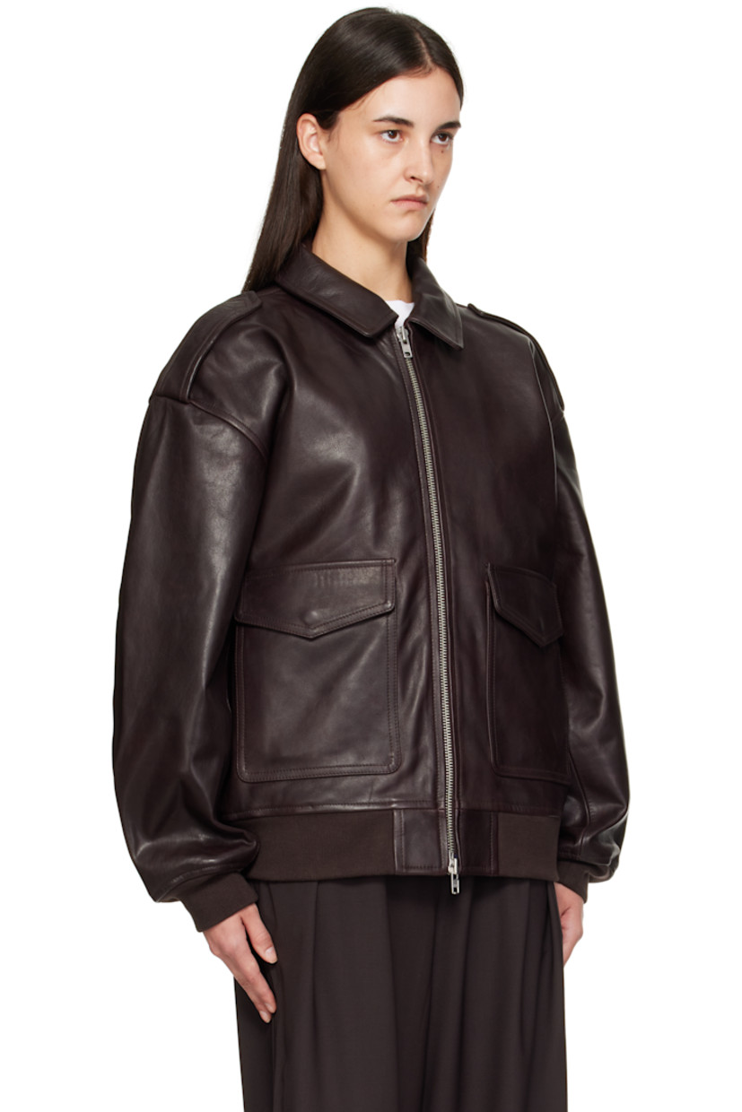 Heavyweight grained leather jacket.

· Oversized
· Spread collar
· Two-way zip closure
· Flap pockets and concealed welt pockets at waist 
· Fixed epaulets
· Dropped shoulders
· Rib-knit hem and cuffs
· Full satin lining

Supplier color: Dark Plum