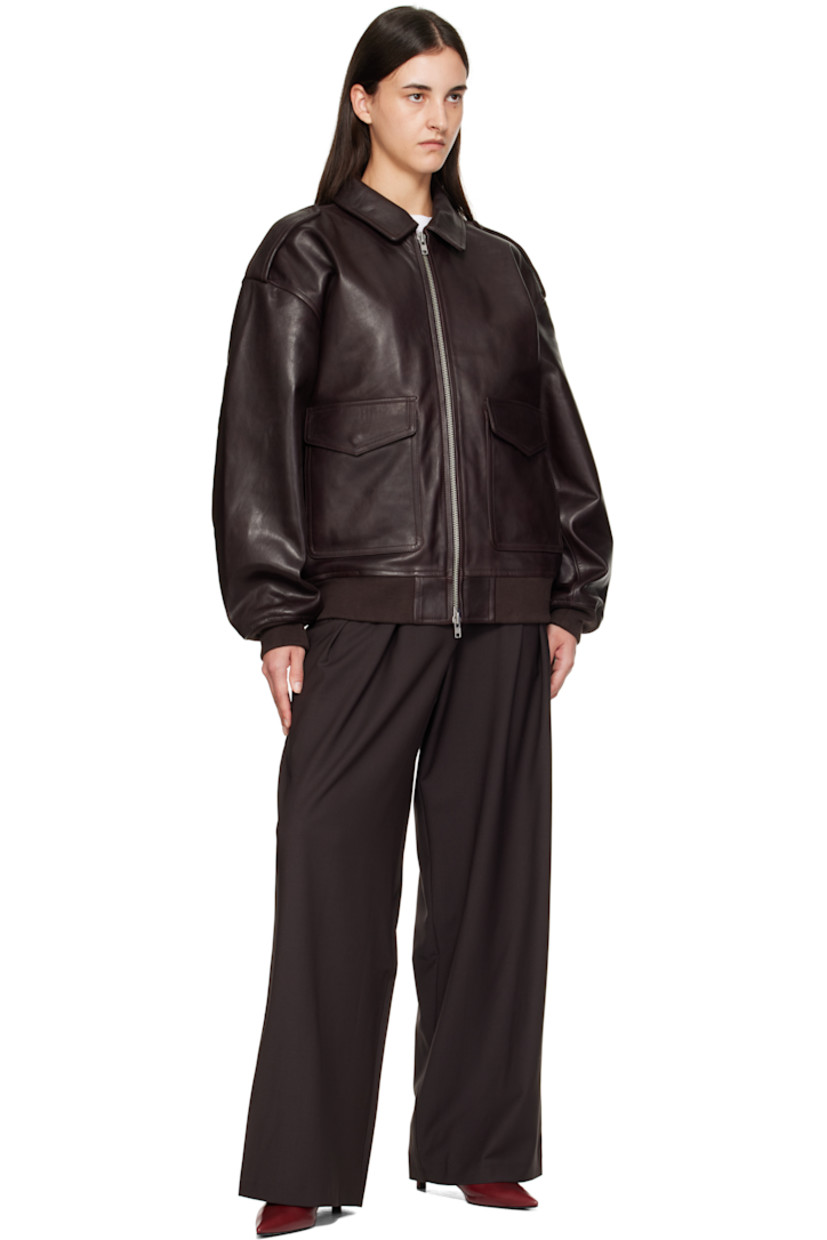 Heavyweight grained leather jacket.

· Oversized
· Spread collar
· Two-way zip closure
· Flap pockets and concealed welt pockets at waist 
· Fixed epaulets
· Dropped shoulders
· Rib-knit hem and cuffs
· Full satin lining

Supplier color: Dark Plum