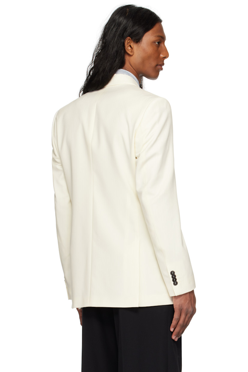 Wool twill blazer. 

· Peaked lapel
· Double-breasted button closure
· Patch pockets
· Padded shoulders
· Surgeon's cuffs
· Vents at back hem
· Welt pockets at interior
· Full satin lining

Supplier color: Light ivory