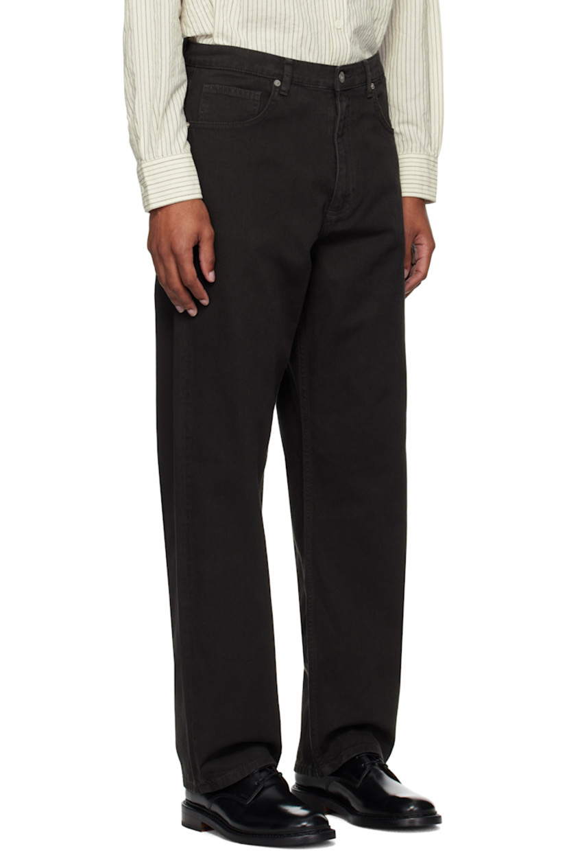 Loose-fit heavyweight 340 gsm cotton twill trousers.

· Garment-dyed
· High-rise
· Belt loops
· Five-pocket styling
· Zip fly
· Logo patch at back pocket

Supplier color: Black
