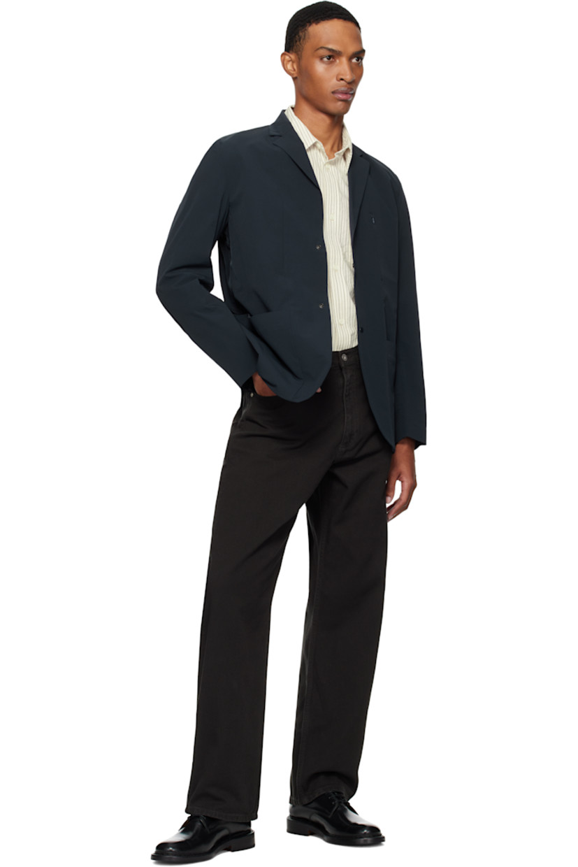 Loose-fit heavyweight 340 gsm cotton twill trousers.

· Garment-dyed
· High-rise
· Belt loops
· Five-pocket styling
· Zip fly
· Logo patch at back pocket

Supplier color: Black