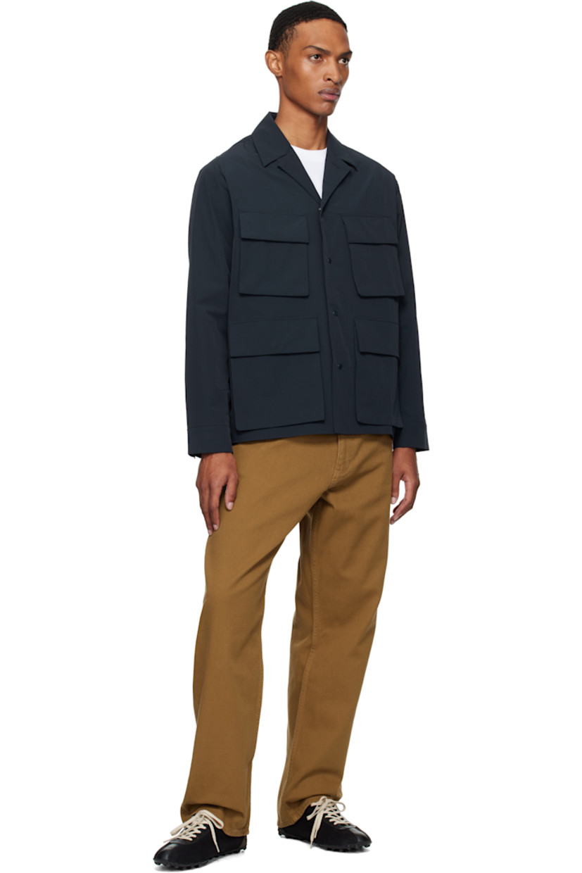 Loose-fit heavyweight 340 gsm cotton twill trousers.

· Garment-dyed
· High-rise
· Belt loops
· Five-pocket styling
· Zip fly
· Logo patch at back pocket

Supplier color: Duck