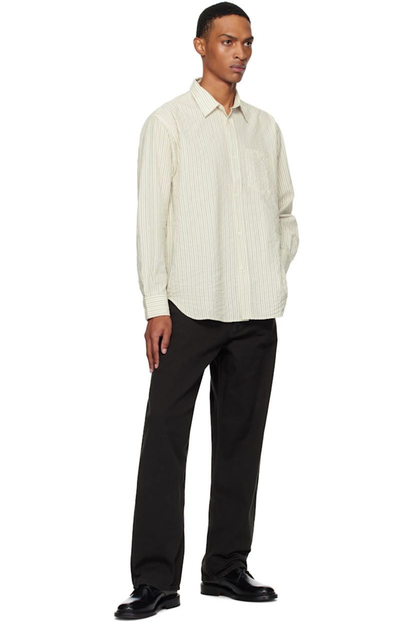 Stretch cotton-blend seersucker shirt. Stripes throughout.

· Spread collar
· Button closure
· Patch pocket at chest
· Shirttail hem
· Buttoned barrel cuffs
· Box pleat at back yoke

Supplier color: Chestnut