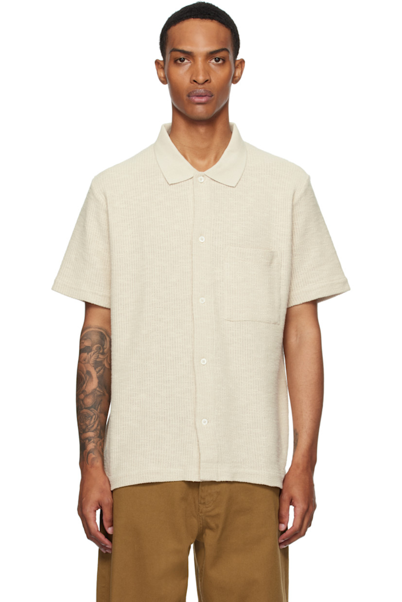 Heavyweight purl-knit 230 gsm organic cotton-blend shirt.

· Spread collar
· Button closure
· Patch pocket

Supplier color: Oatmeal