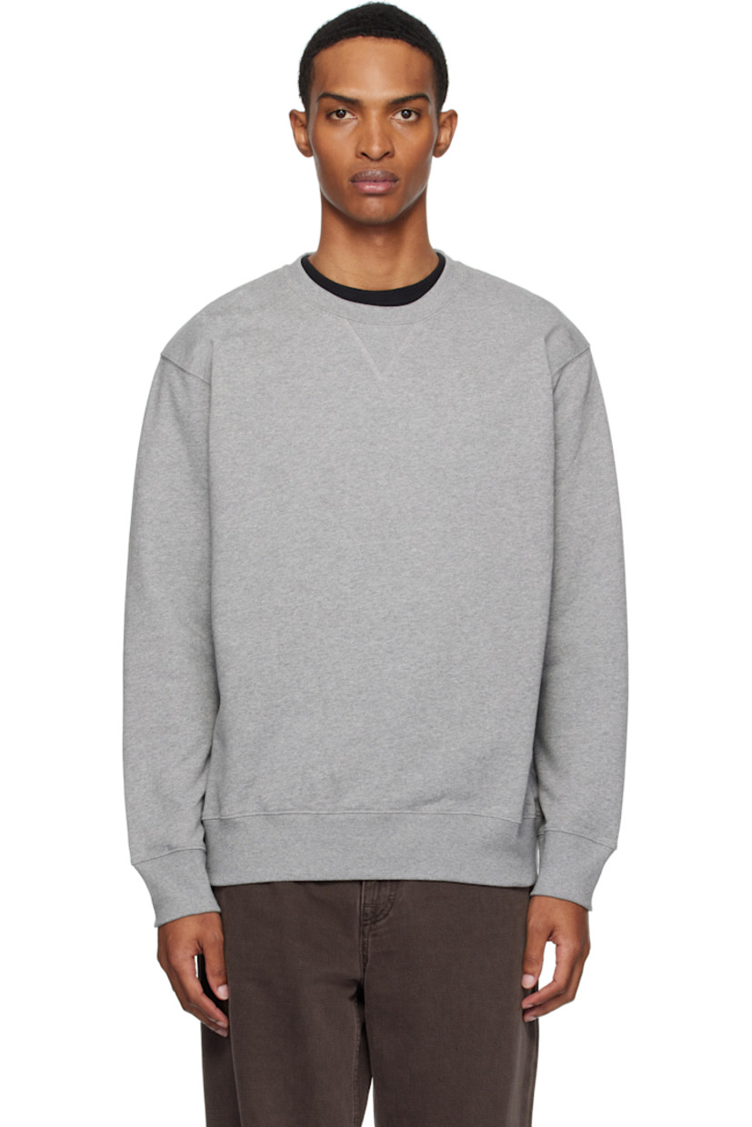 385 gsm organic cotton French terry sweatshirt.

· Rib-knit crewneck, hem, and cuffs
· Logo flag at side seam

Supplier color: Grey melange