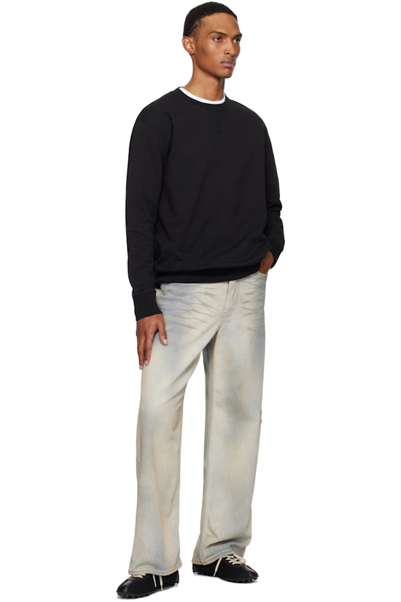 385 gsm organic cotton French terry sweatshirt.

· Rib-knit crewneck, hem, and cuffs
· Logo flag at side seam

Supplier color: Black
