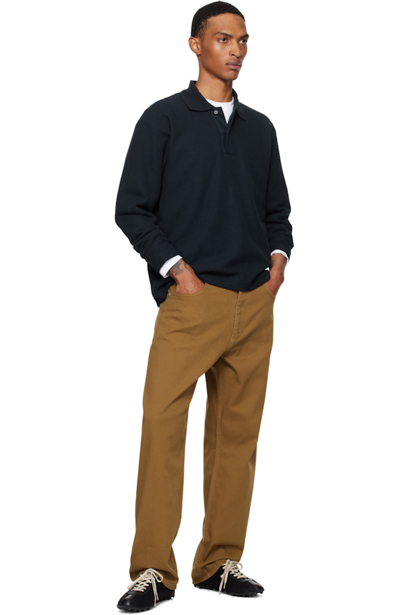 Rib-knit cotton-blend polo.

· Spread collar
· Two-button placket

Supplier color: Dark navy