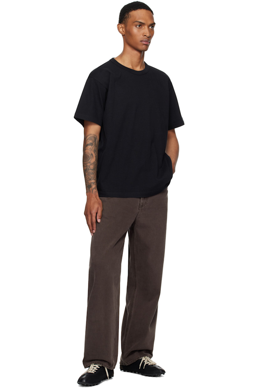 Heavyweight 290 gsm organic cotton jersey T-shirt.

· Rib-knit crewneck
· Dropped shoulders
· Logo-embroidered locker loop at back collar

Supplier color: Black