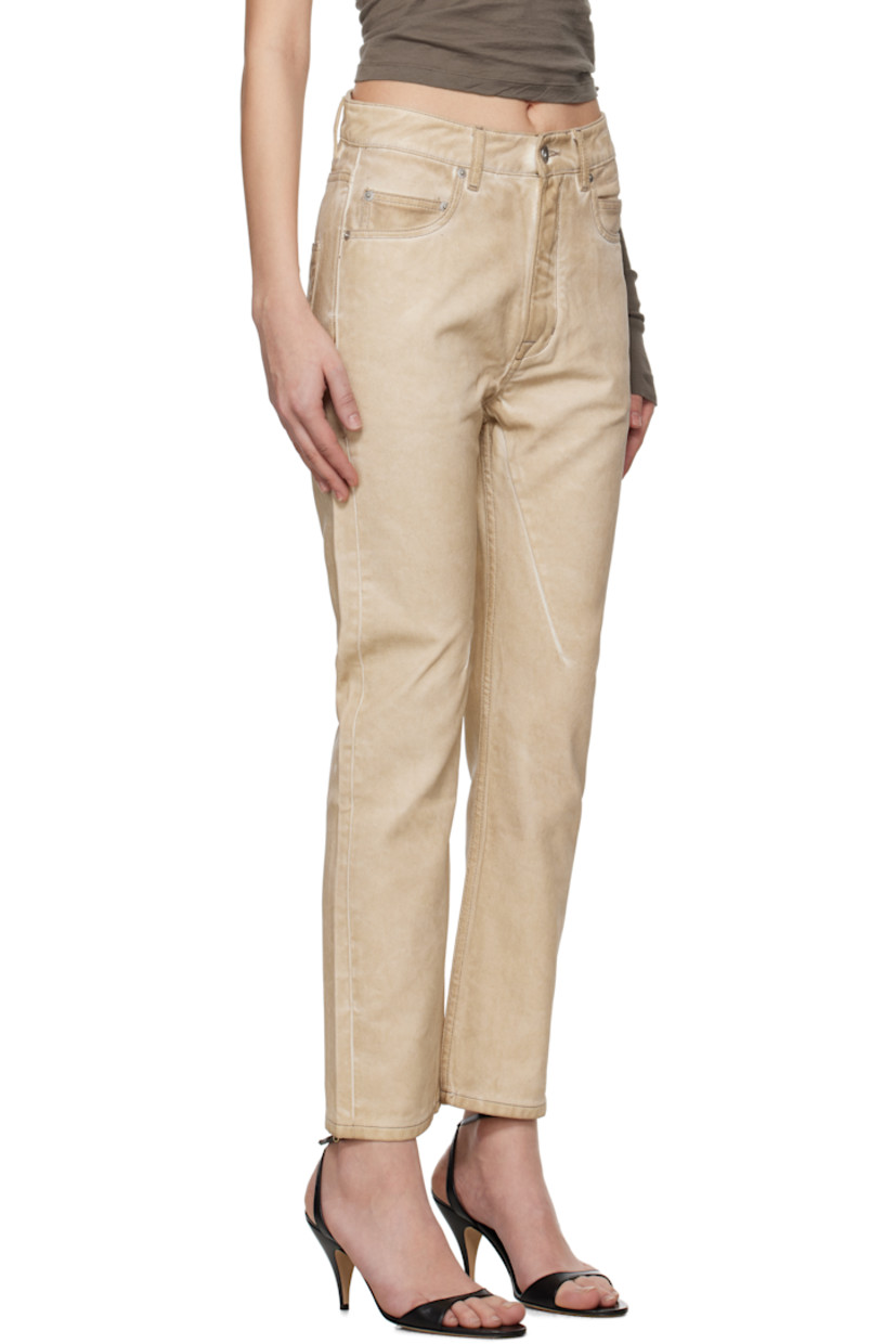Overdyed and foil-coated non-stretch organic cotton denim jeans. Fading throughout.

· ZDHC-certified denim
· GOTS-certified organic cotton
· Low-rise
· Belt loops
· Six-pocket styling
· Zip fly
· Cropped leg
· Dart at inseams

Supplier color: Parchment