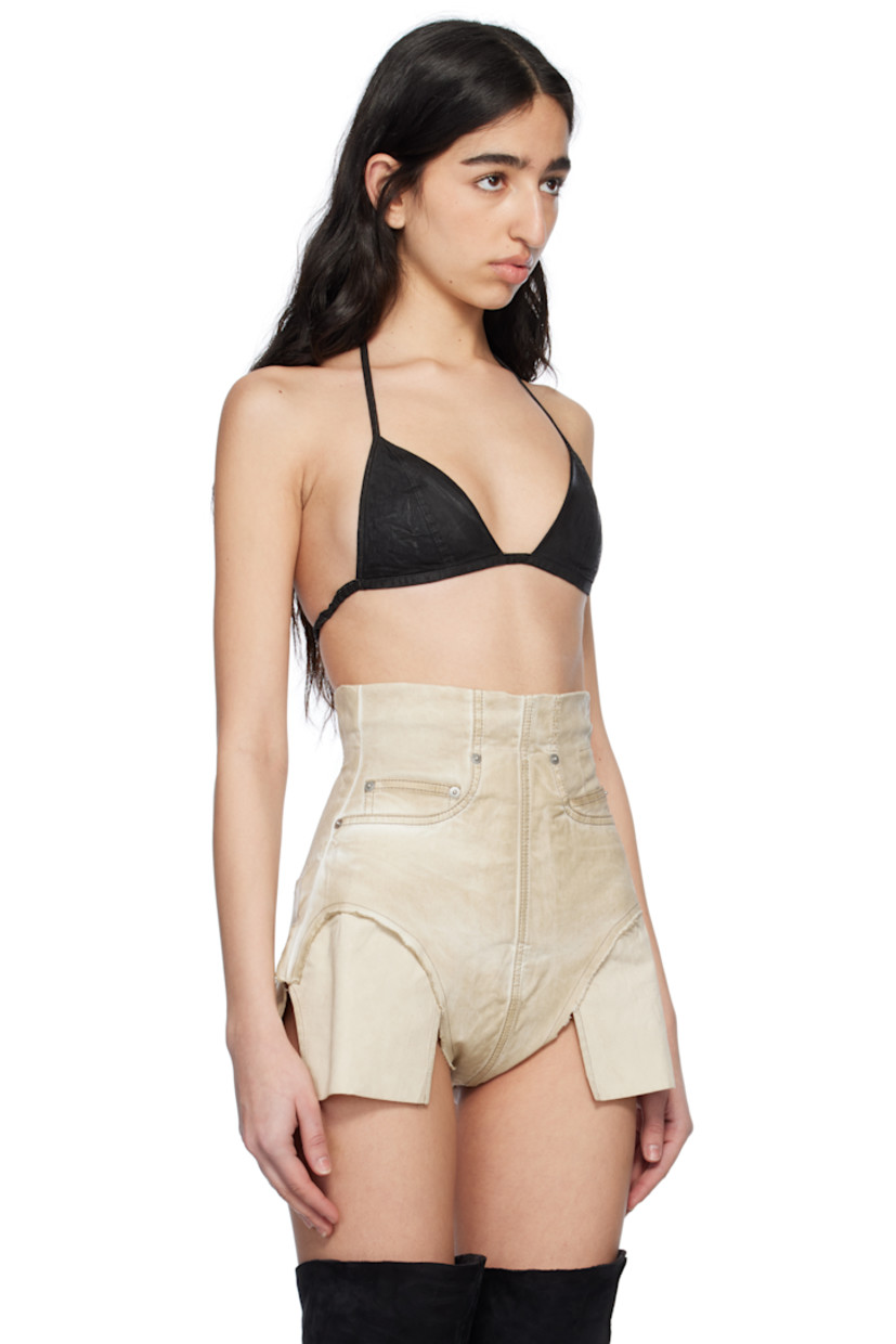 Overdyed and foil-coated lightweight stretch denim bra. Fading throughout.

· ZDHC-certified denim
· Self-tie halter strap
· Hook-eye fastening at back
· Full poplin lining

Each item is unique. Please note that coloration and finishing may vary.

Supplier color: Black