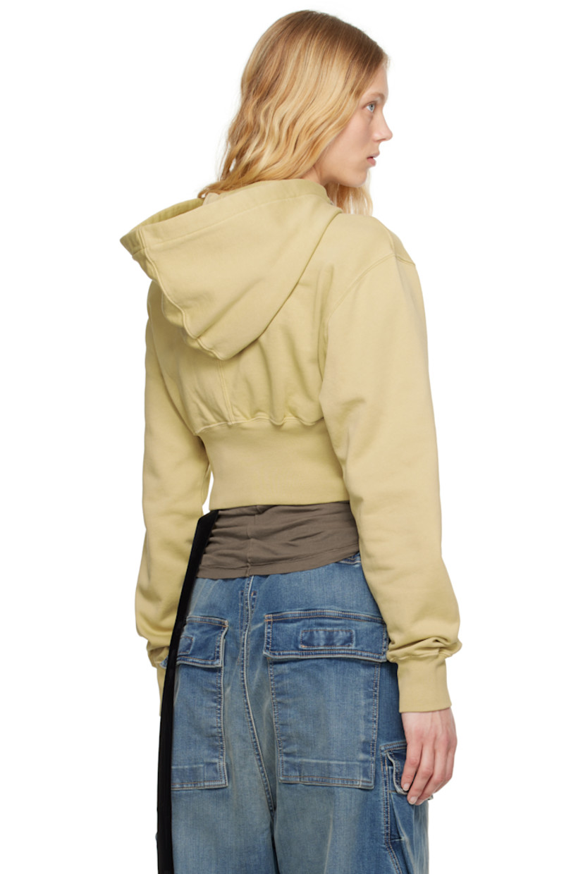GOTS-certified organic cotton fleece hoodie.

· Drawstring at hood
· Cropped hem
· Rib-knit hem and cuffs
· Central seam at back
· Logo-woven webbing strap at interior

Supplier color: Parchment