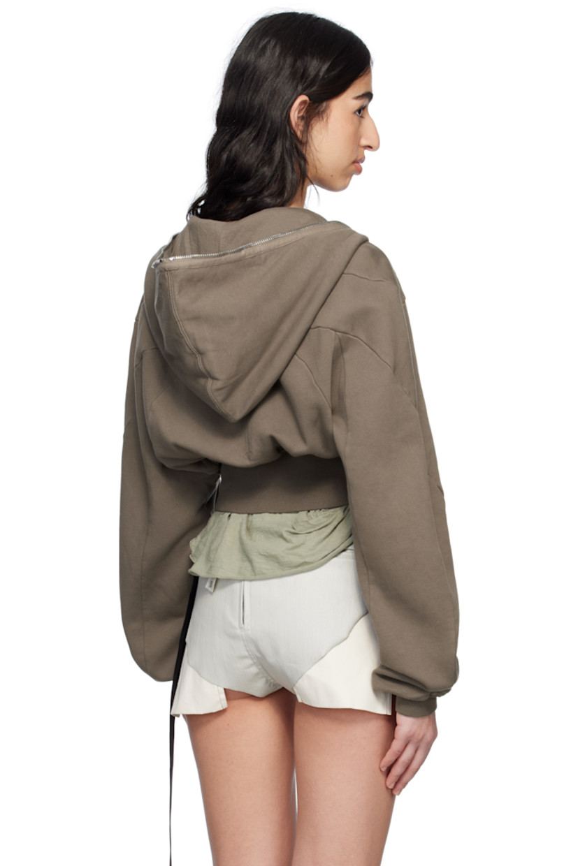 Heavyweight GOTS-certified organic cotton fleece hoodie.

· Garment-washed
· Paneled construction
· Zip closure extends to hood
· Rib-knit cropped hem and cuffs
· Dropped shoulders
· Logo-woven webbing strap at interior 

Supplier color: Dust