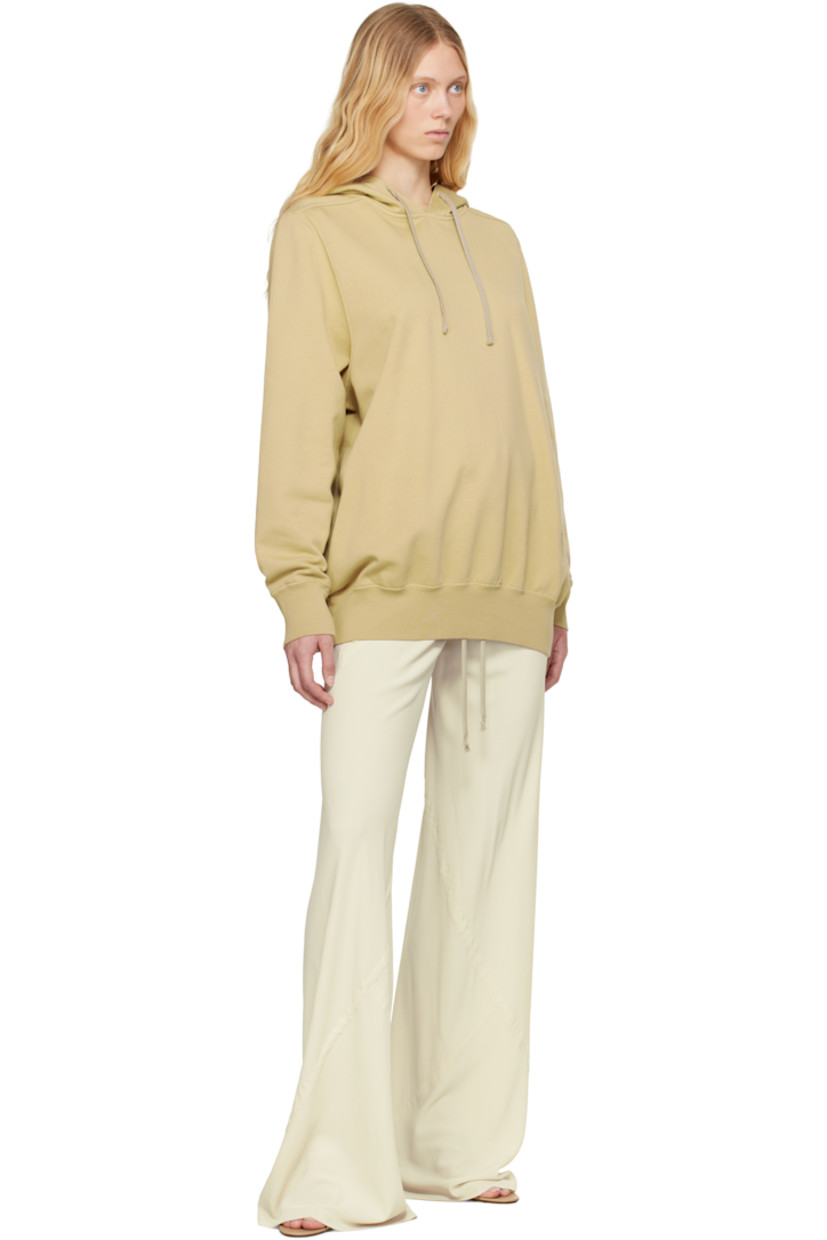 GOTS-certified organic cotton fleece hoodie.

· Drawstring at hood
· Rib-knit hem and cuffs
· Saddle shoulders
· Central seam at back
· Logo-woven webbing strap at interior

Supplier color: Parchment
