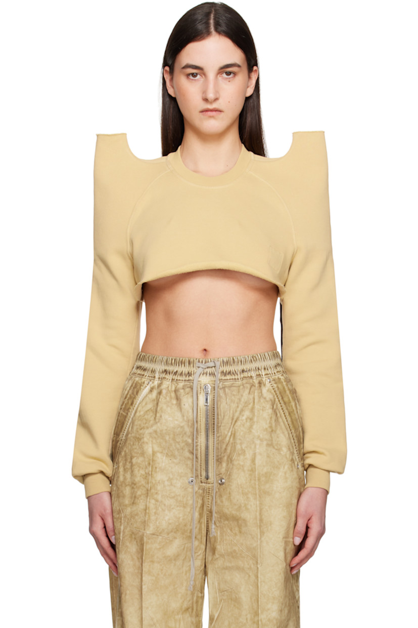 Heavyweight GOTS-certified organic cotton fleece sweatshirt.

· Garment-dyed 
· Rib-knit crewneck and cuffs
· Raw edge at cropped hem
· Cutout with raw edge at pagoda shoulders
· Raglan sleeves
· Logo-woven webbing strap at interior
· Partial jersey lining

Supplier color: Parchment