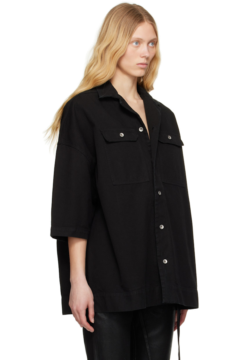 Foil-coated and garment-dyed organic cotton canvas shirt. Fading throughout.

· GOTS-certified organic cotton
· Open spread collar
· Button closure
· Flap pockets
· Logo-woven webbing strap at interior 

Each item is unique. Please note that coloration and finishing may vary.

Supplier color: Black