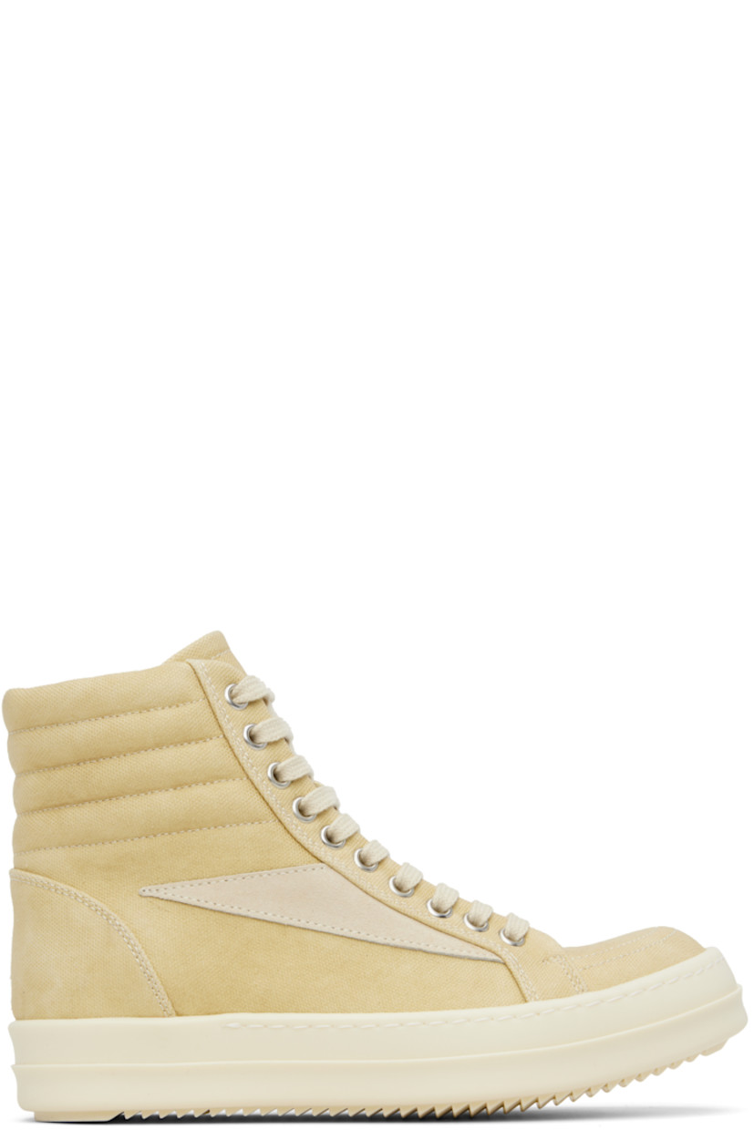 High-top GOTS-certified organic cotton canvas sneakers.

· Lace-up closure
· Padded and quilted collar
· Calfskin suede appliqué at sides
· Twill lining
· Treaded rubber sole

Supplier color: Parchment/Milk/Milk