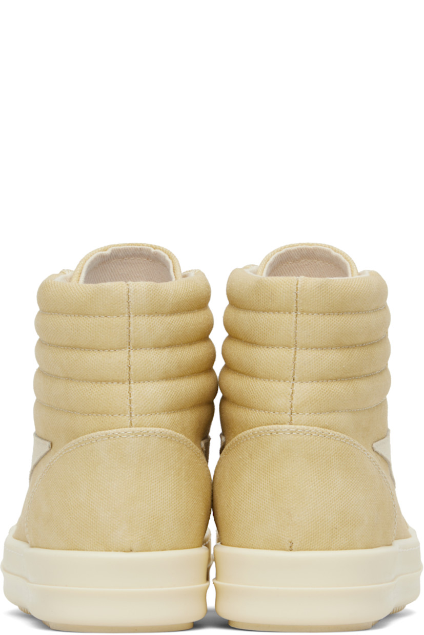 High-top GOTS-certified organic cotton canvas sneakers.

· Lace-up closure
· Padded and quilted collar
· Calfskin suede appliqué at sides
· Twill lining
· Treaded rubber sole

Supplier color: Parchment/Milk/Milk