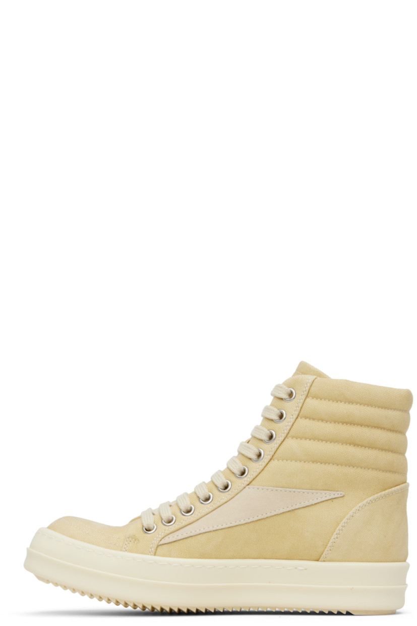 High-top GOTS-certified organic cotton canvas sneakers.

· Lace-up closure
· Padded and quilted collar
· Calfskin suede appliqué at sides
· Twill lining
· Treaded rubber sole

Supplier color: Parchment/Milk/Milk