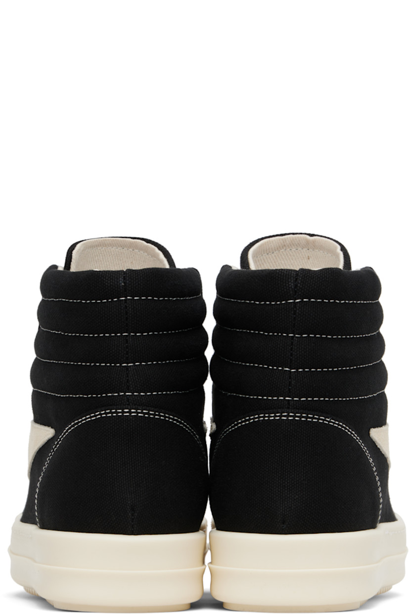 High-top GOTS-certified organic cotton canvas sneakers.

· Lace-up closure
· Padded and quilted collar
· Calfskin suede appliqué at sides
· Twill lining
· Treaded rubber sole

Supplier color: Black/Milk/Milk