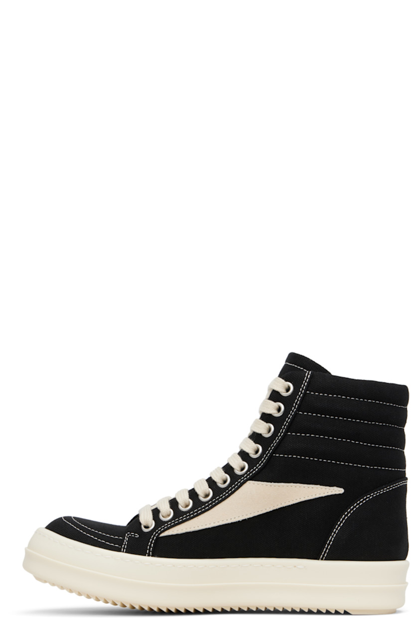 High-top GOTS-certified organic cotton canvas sneakers.

· Lace-up closure
· Padded and quilted collar
· Calfskin suede appliqué at sides
· Twill lining
· Treaded rubber sole

Supplier color: Black/Milk/Milk