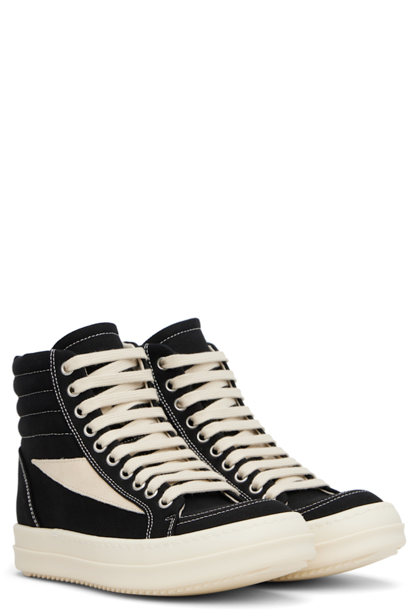 High-top GOTS-certified organic cotton canvas sneakers.

· Lace-up closure
· Padded and quilted collar
· Calfskin suede appliqué at sides
· Twill lining
· Treaded rubber sole

Supplier color: Black/Milk/Milk