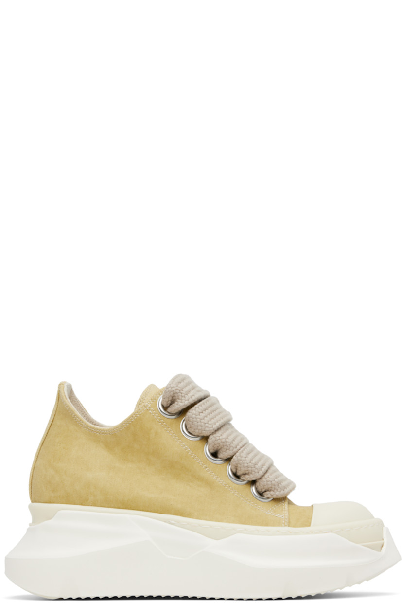 Low-top 10 oz denim sneakers.

· Overdyed and foil-coated
· ZDHC-certified denim
· Faux-leather cap toe
· Lace-up closure
· Metal eyelets at inner side
· Twill lining
· Sculptural rubber platform midsole
· Treaded rubber sole
· Platform: H2.5"

Supplier color: Parchment/Milk/Milk