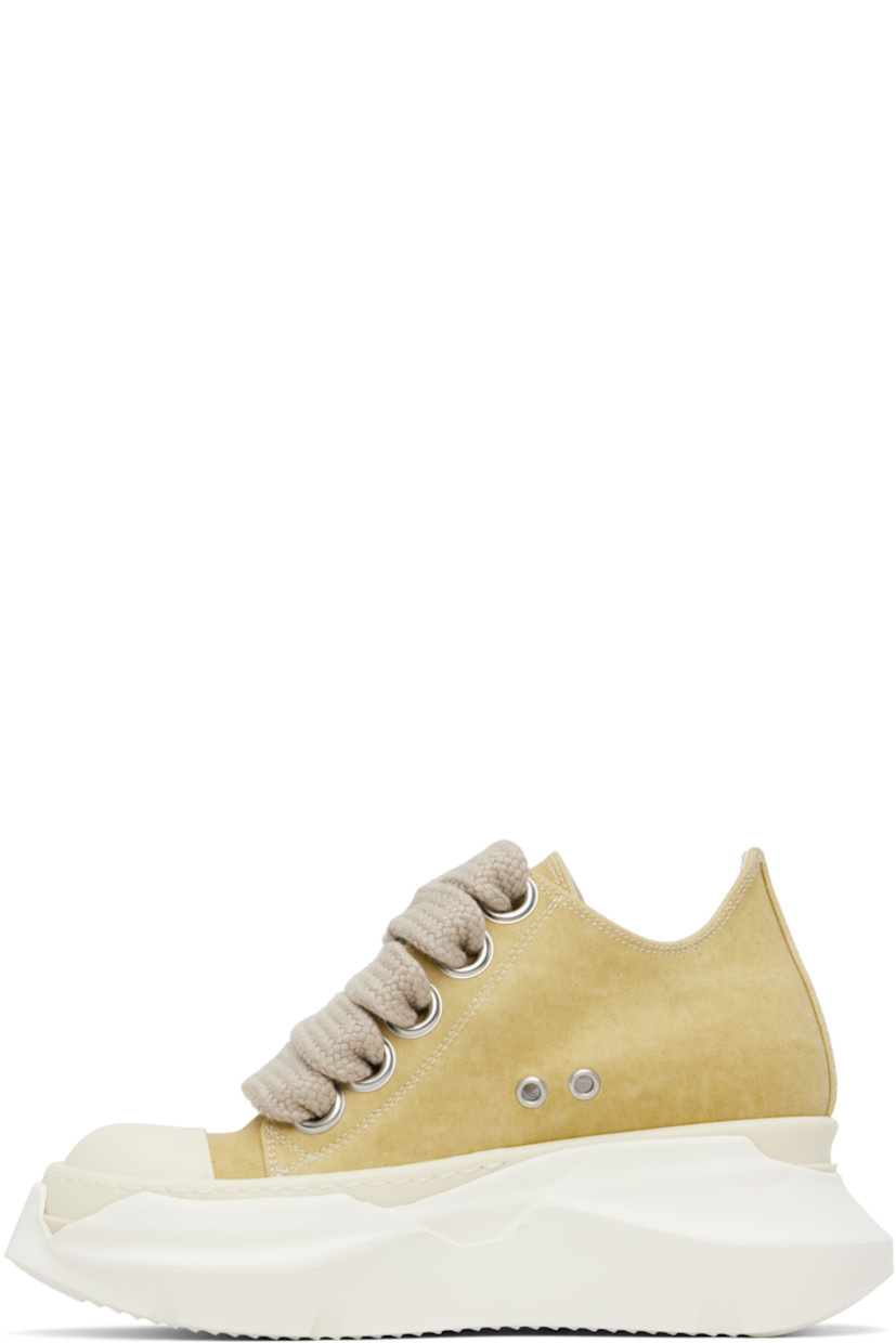 Low-top 10 oz denim sneakers.

· Overdyed and foil-coated
· ZDHC-certified denim
· Faux-leather cap toe
· Lace-up closure
· Metal eyelets at inner side
· Twill lining
· Sculptural rubber platform midsole
· Treaded rubber sole
· Platform: H2.5"

Supplier color: Parchment/Milk/Milk