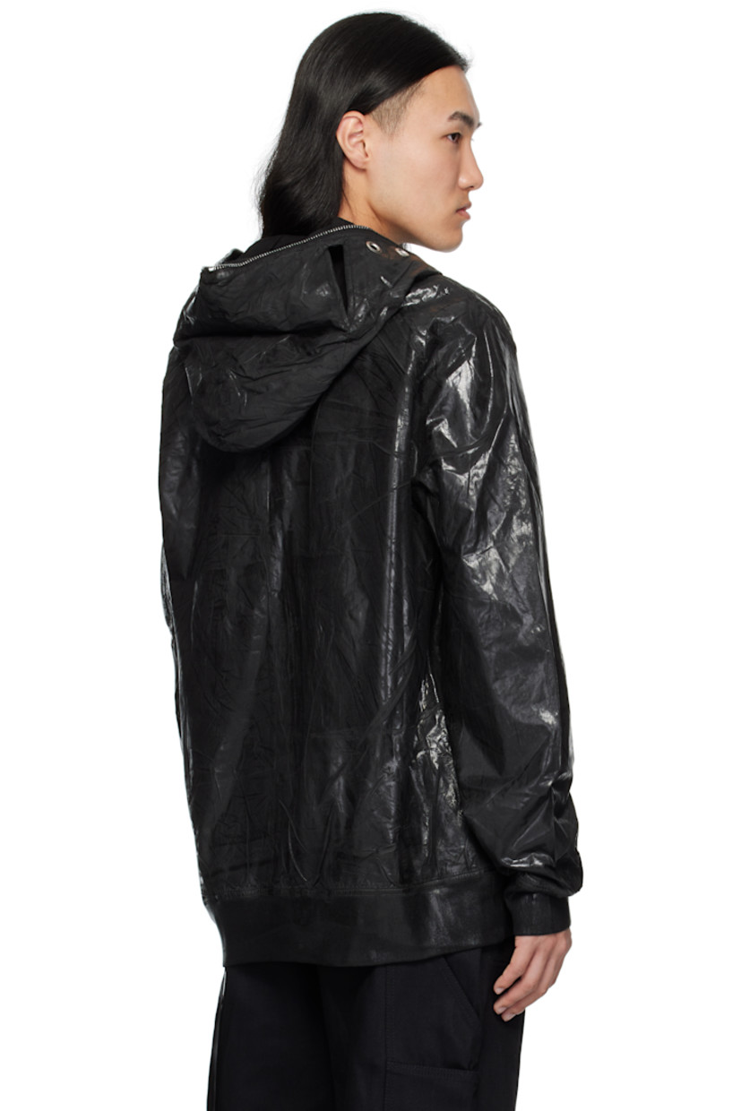 Padded lightweight organic cotton poplin bomber jacket.

· Foil-coated and garment-dyed
· GOTS-certified organic cotton
· Cutout and metal eyelets at hood
· Zip closure extends to hood
· Patch pockets
· Rib-knit hem and cuffs
· Welt pockets at interior
· Integrated logo-woven strap at interior
· Full satin and poplin lining

Supplier color: Black