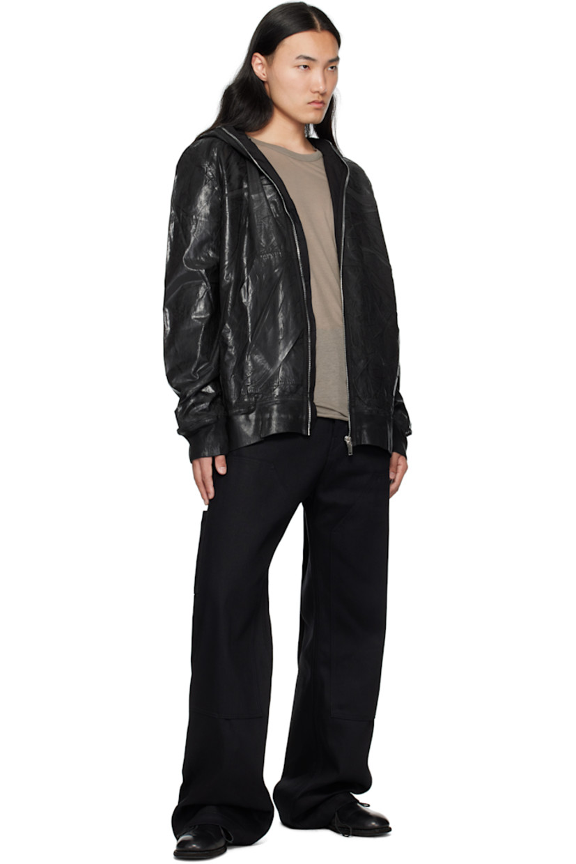 Padded lightweight organic cotton poplin bomber jacket.

· Foil-coated and garment-dyed
· GOTS-certified organic cotton
· Cutout and metal eyelets at hood
· Zip closure extends to hood
· Patch pockets
· Rib-knit hem and cuffs
· Welt pockets at interior
· Integrated logo-woven strap at interior
· Full satin and poplin lining

Supplier color: Black