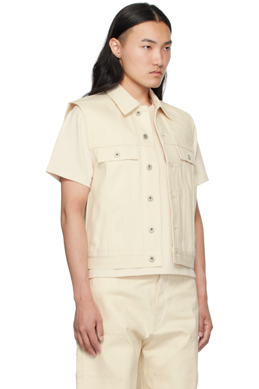 Heavyweight 16 oz non-stretch denim vest.

· Spread collar
· Button closure
· Flap and seam pockets
· Adjustable button tabs at back hem

Supplier color: Natural